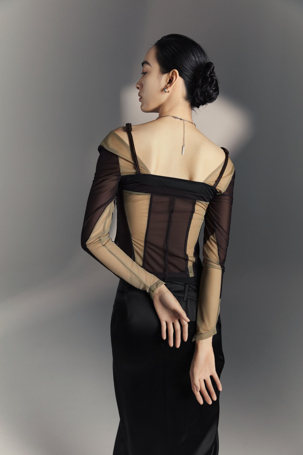 Misplaced waistline and twisted half skirt