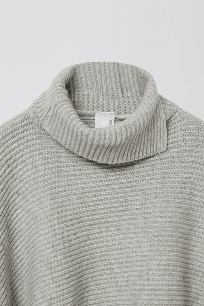 SLIT WOOL KNIT CAPE MELANGE