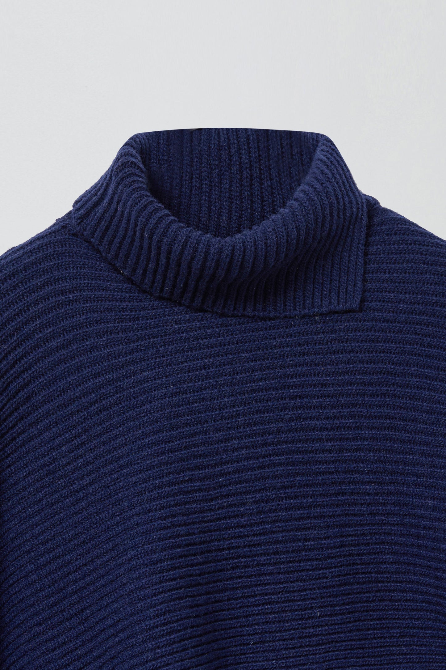 SLIT WOOL KNIT CAPE NAVY