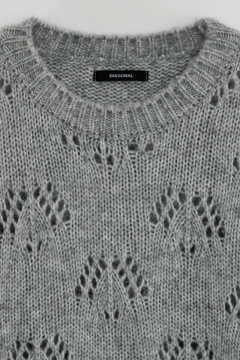 POINTELLE OVER KNIT