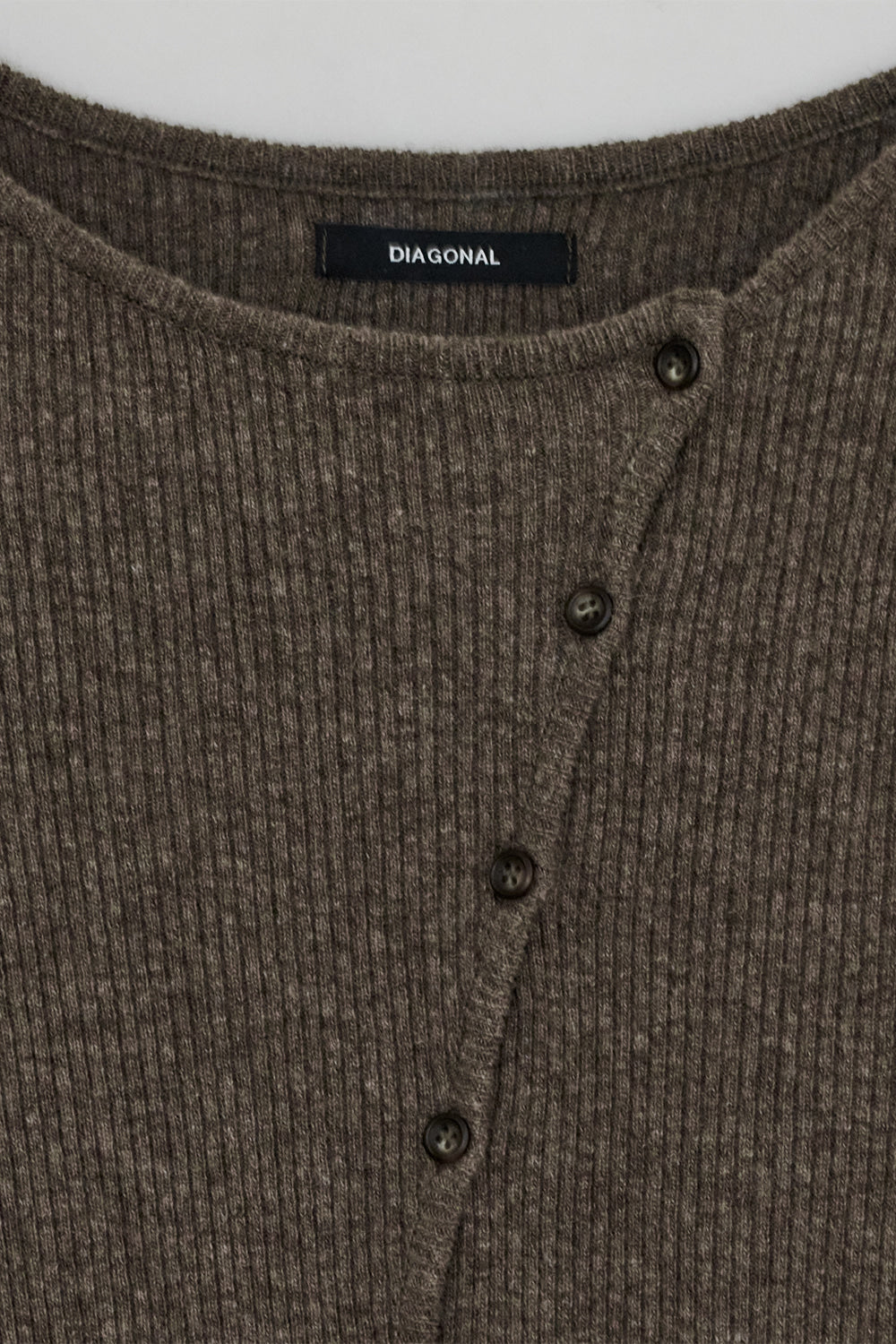 DIAGONAL BUTTON KNIT