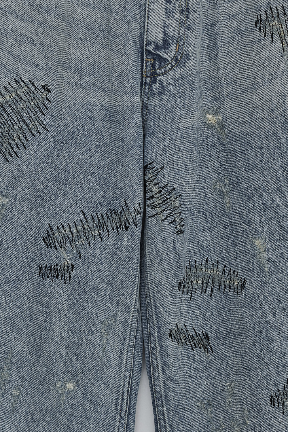 STITCHED DENIM PANTS