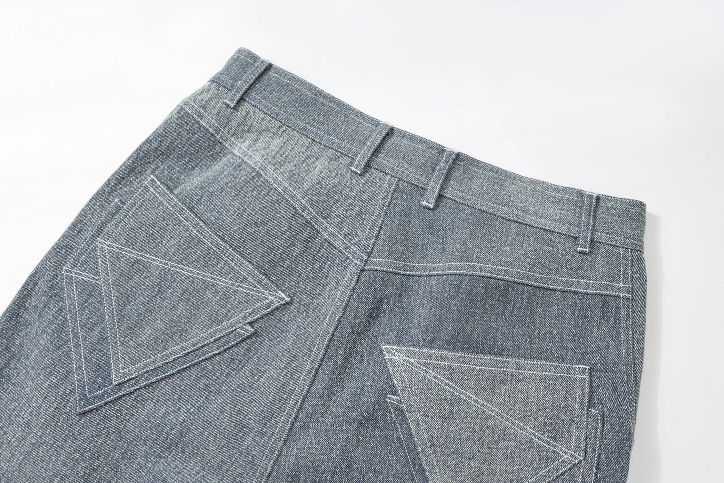 Belted layered jeans