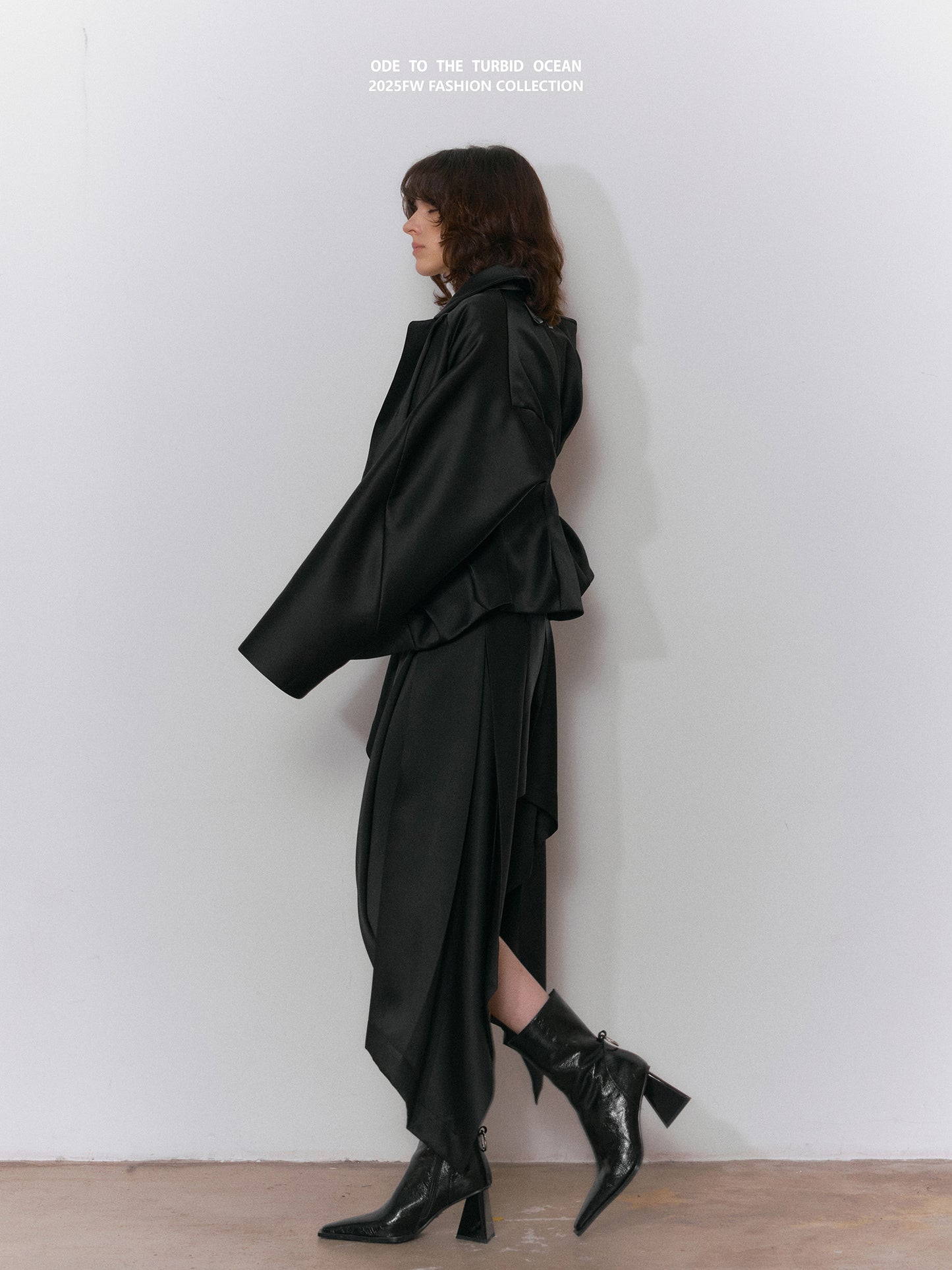 ODE TO THE TURBID OCEAN Textured Ruffled Black Glossy 3D Cropped Jacket